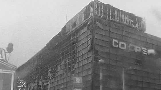 Belfast Co-op building on York Street on fire following bomb explosion (1972)