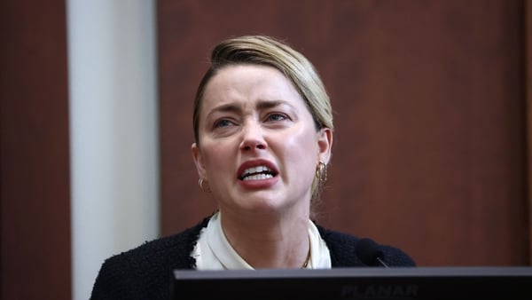 Amber Heard testifies at the Fairfax County Circuit Courthouse in Fairfax, Virginia, on May 5, 2022. (Photo by JIM LO SCALZO / POOL / POOL / AFP) (Photo by JIM LO SCALZO / POOL/POOL/AFP via Getty Images)