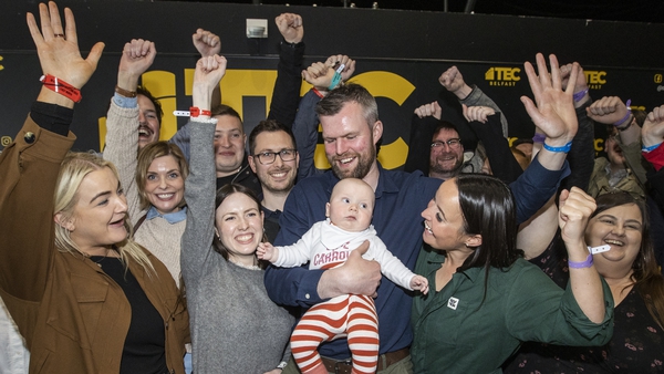 People Before Profit candidates Fiona Ferguson (centre, second left) and Gerry Carroll holding his son Feilimi
