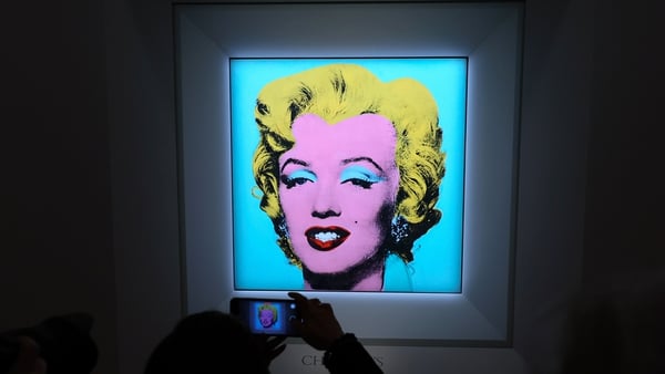 Warhol's 1964 'Shot Sage Blue Marilyn' goes under the hammer in New York