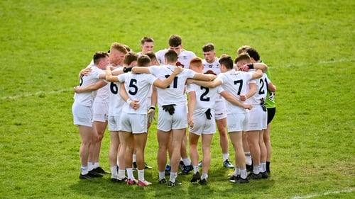 The Kildare players in a huddle prior to their win over Sligo