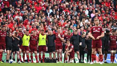 Munster players and staff look on during the 'place kick' competition