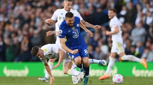 Mateo Kovacic of Chelsea is fouled by Daniel James of Leeds United