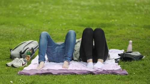 People lying on a blanket in the National Botanic Gardens in Dublin, as the city enjoyed a spell of sunny weather earlier this week (Photograph: Leah Farrell/RollingNews.ie)