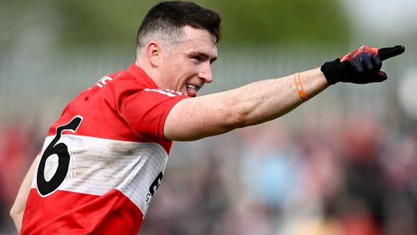 Gareth McKinless salutes a score against Tyrone