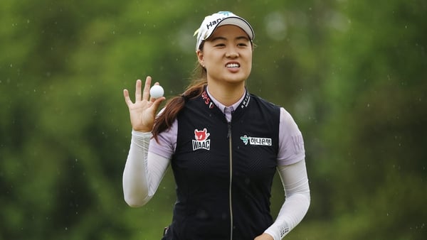 Minjee Lee reacts after sinking a putt on the 18th green during the third round