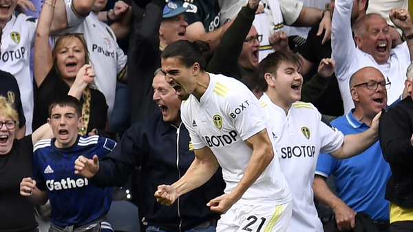 Pascal Struijk celebrates in front of Leeds fans after scoring their late equaliser