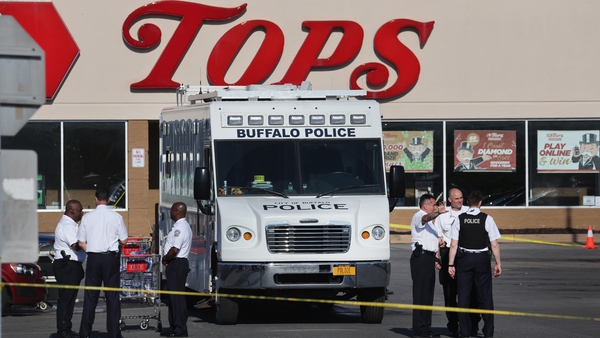 The scene outside the Tops supermarket, where 13 people were shot, 10 of whom died