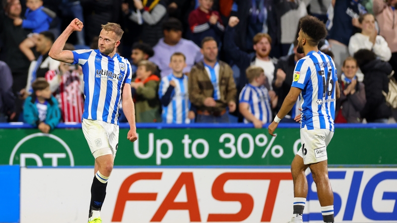 Jordan Rhodes (c) celebrates his priceless goal