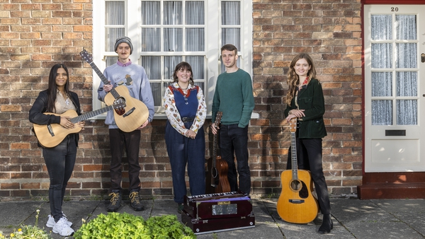 Pictured are artists (L-R) Serena Ittoo, Dullan, Humm who are Carys Lewin and Arty Jackson, and Emily Theodora outside 20 Forthlin Road in Liverpool, the childhood home of Paul and Mike McCartney Photos: Press Association