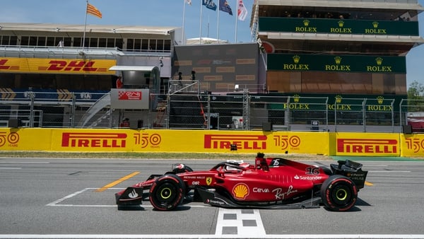 Charles Leclerc crosses the line to seal pole position at the Circuit de Catalunya