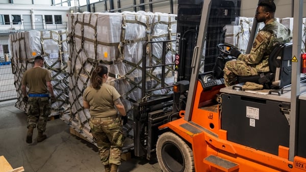 US airmen loaded pallets with baby formula yesterday which arrived in Germany from Switzerland for the US