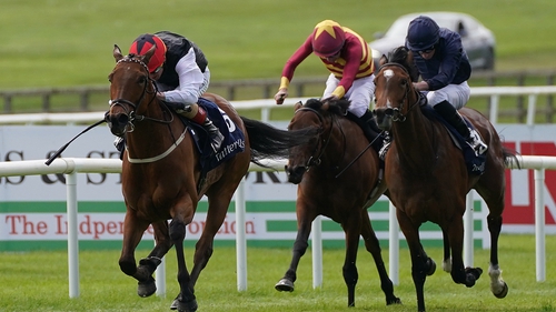 Homeless Songs ridden by Chris Hayes (left) on the way to winning the Irish 1,000 Guineas on 22 May