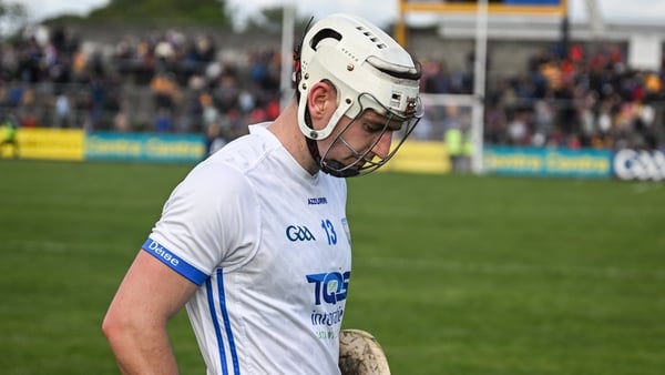 Dessie Hutchison leaves the pitch dejected at Cusack Park after Waterford's heavy defeat to Clare