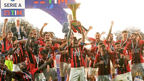 AC Milan captain Alessio Romagnoli lifts the Serie A Scudetto trophy