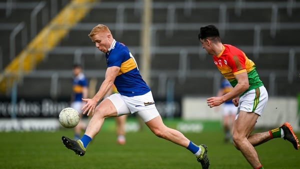 Teddy Doyle (L) in action against Carlow's Niall Hickey in the league