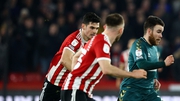 Aaron Connolly being chased by Ireland team-mate John Egan as Sheffield United hosted Middlesbrough