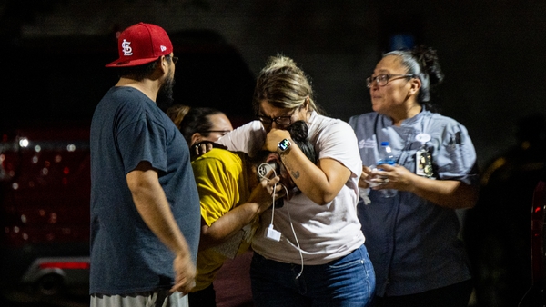 Families gather following the mass shooting at Robb Elementary School in Uvalde, Texas