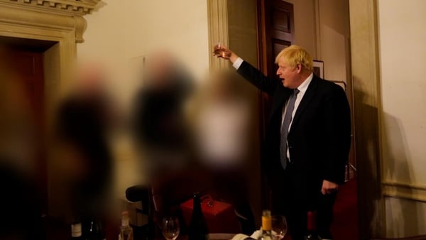Boris Johnson raises a glass at a leaving party for a senior adviser on 13 November 2020