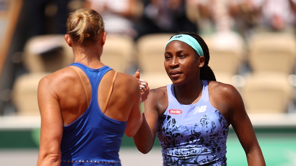 Gauff and Kaia Kanepi greet each other at the net after the former's victory