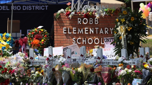 Flowers and tributes at Robb Elementary School in Uvalde