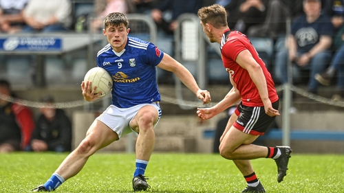 James Smith confronted by Adam Lynch in Cavan's handsome win over Down