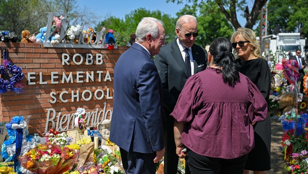 US President Joe Biden greets the principal of Robb Elementary School in Uvalde earlier today