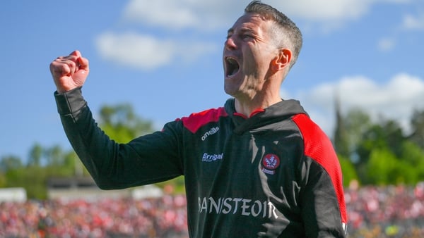 Derry manager Rory Gallagher celebrates a late point during the Ulster final