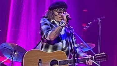 Johnny Depp performs on stage with Jeff Beck