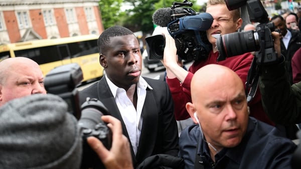 Kurt Zouma (centre) arriving at the Thames Magistrates' Court in London