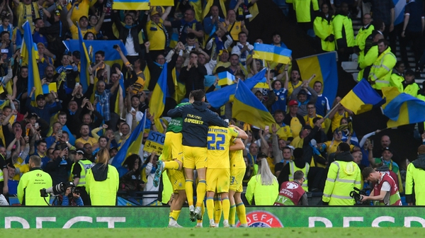 The Ukraine players celebrate going 3-1 up in Scotland