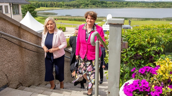 Former First Minister Arlene Foster, right, walks with Michelle O'Neil after a meeting of the British-Irish Council at the Lough Erne Resort in Enniskillen, last year
