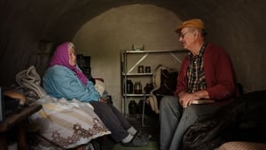 Ukrainian biology professor Oleksiy Polyakov (R), 84, and his wife Galina Polyakova, 81,
in their vegetable cellar transformed into a shelter in eastern Ukraine, on 17 May