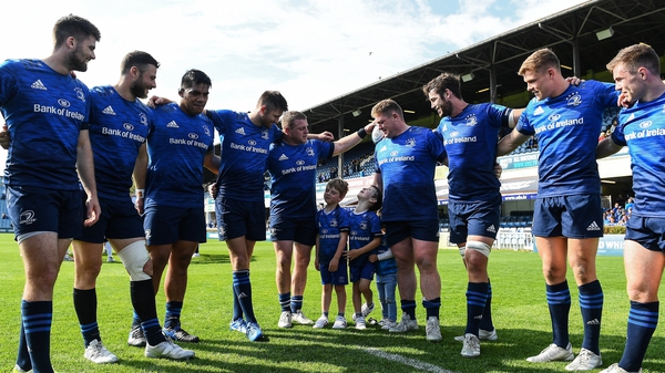 Leinster players gather together after their 76-14 win, joined by Sean Cronin's children Finn, Cillian and Saoirse