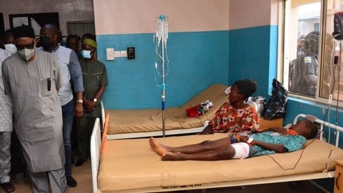 State officials visit injured victims on hospital beds following the 5 June attack in Owo