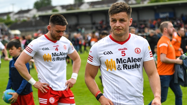 Tyrone players Michael McKernan (r) and Pádraig Hampsey after their championship exit