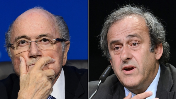 The pair are charged with defrauding the world soccer body