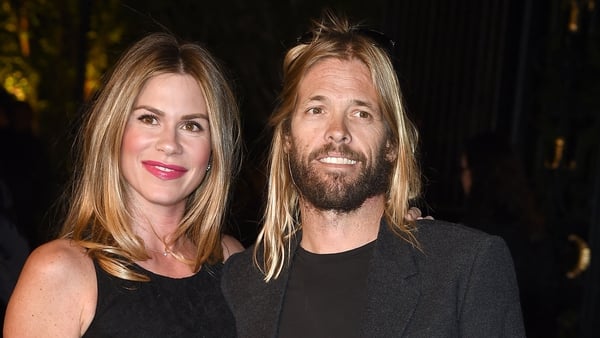 Taylor Hawkins and Alison Hawkins attends the Burberry 