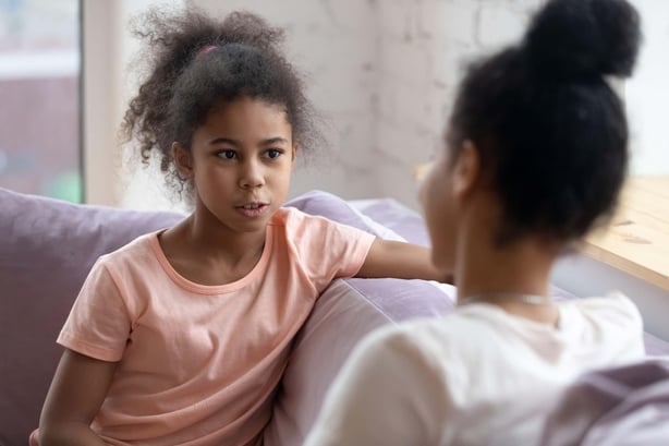 Mother and daughter having an open conversation