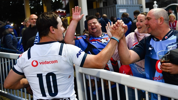 Bulls out-half Chris Smith is congratulated by South African fans after their semi-final win against Leinster at the RDS