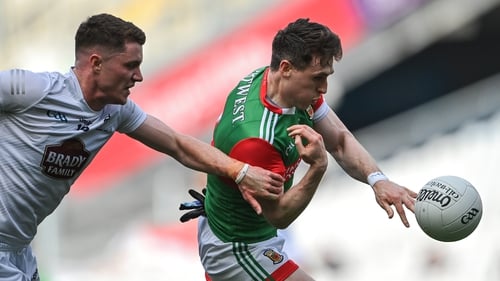 Mayo's Paddy Durcan tries to get away from Kildare's Alex Beirne