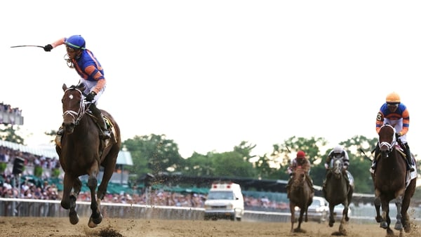 Mo Donegal (l) storms home to take the 154th running of the Belmont Stakes