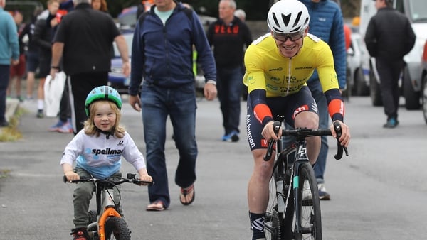 Daire Feely gets some support from three-year-old Charlie McCater