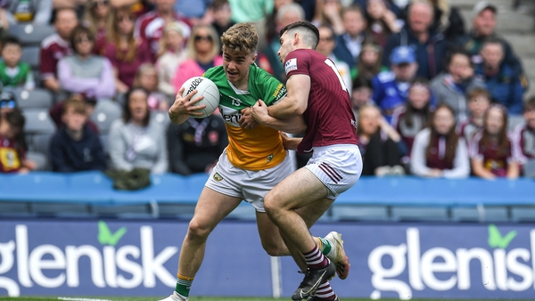 Jack Bryant of Offaly, left, in action against Sam McCartan of Westmeath
