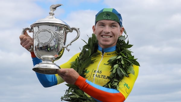 Daire Feeley celebrates with the Rás Tailteann trophy in 2022