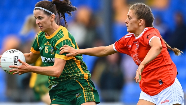 Meath's Niamh O'Sullivan is tackled by Grace Ferguson of Armagh