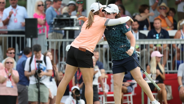 Jennifer Kupcho and Leona Maguire embrace after the former won at the second play-off hole