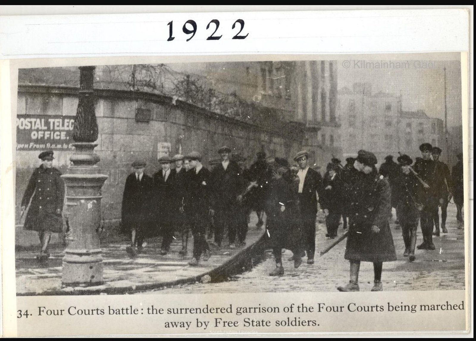 Image - The surrendered garrison is marched away into captivity (Credit: Kilmainham Gaol Archive)