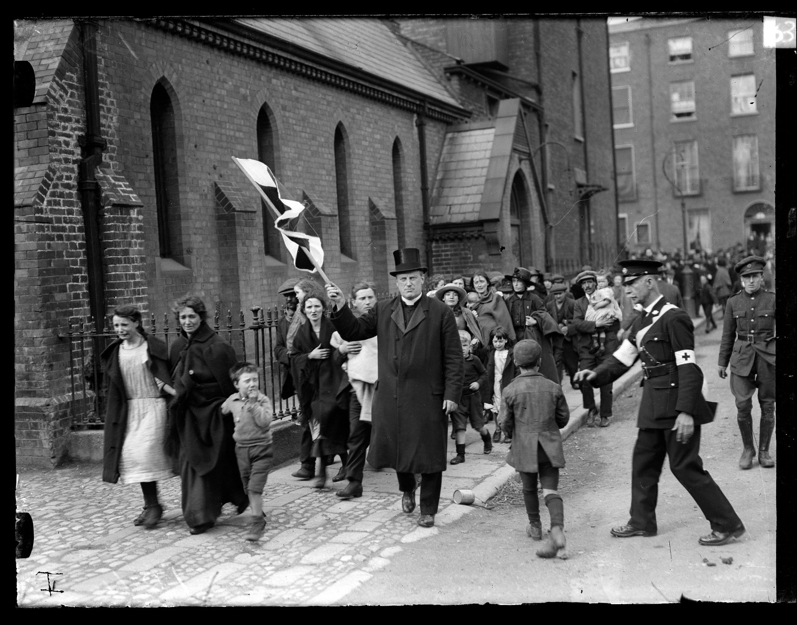 Image - Civilians are evacuated from the streets around The Block (Credits: RTÉ Photographic Archive, the Cashman Collection)