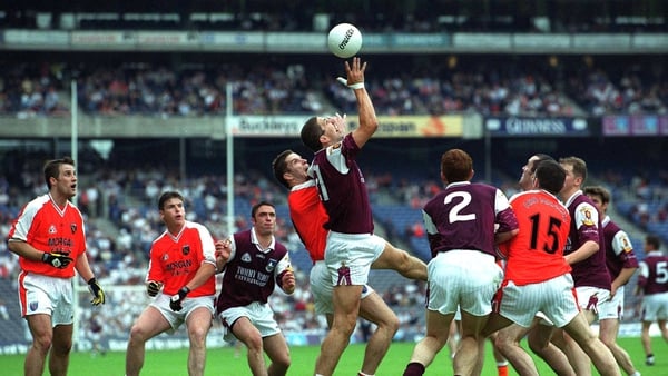 Galway's Sean O'Domhnaill and Armagh's Paul McGrane battle for possession in 2001